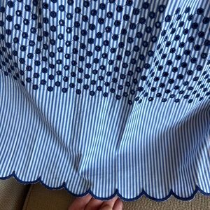 Brand new with tags, Medium. Full, midi length skirt with pockets.